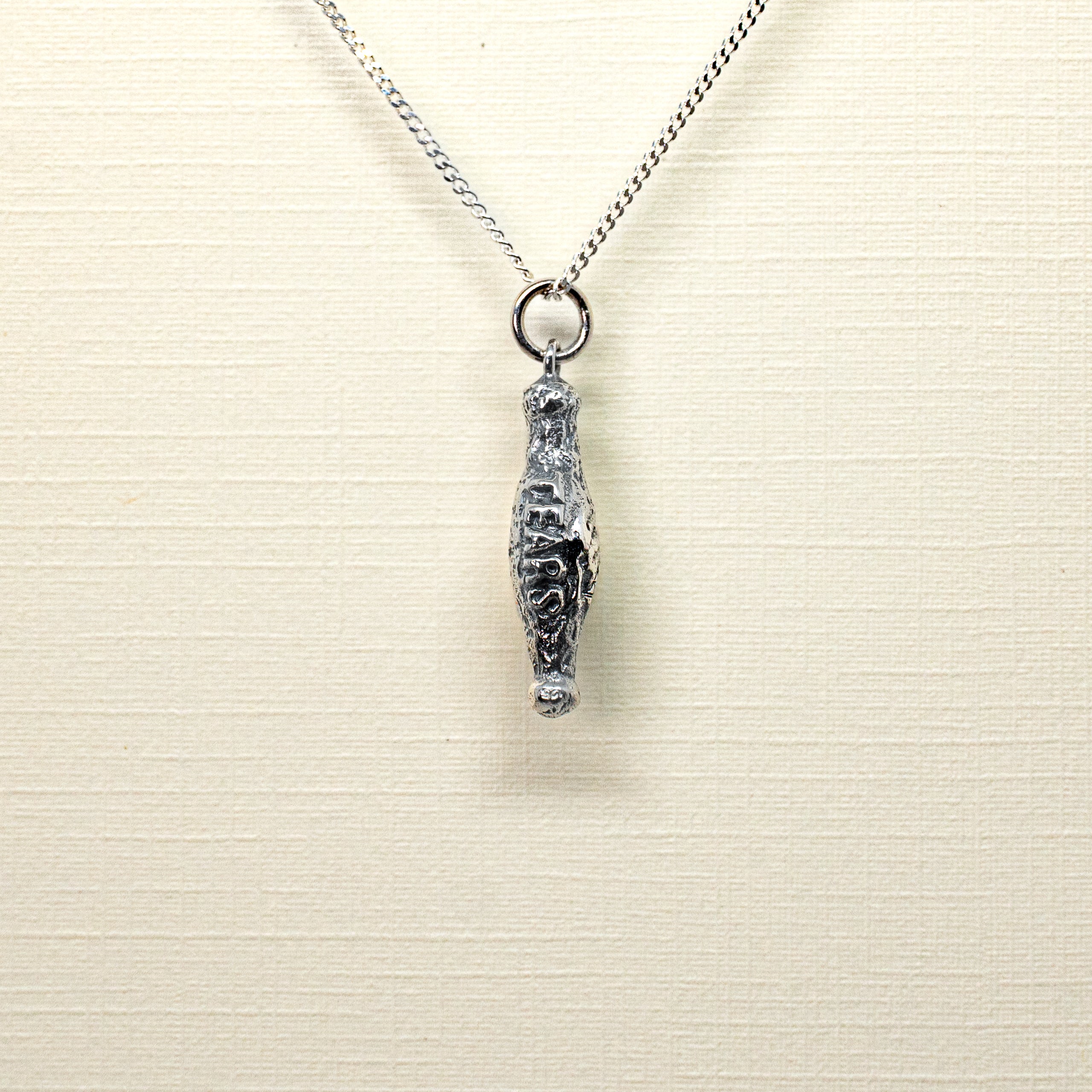 VIAL OF MEN'S TEARS CHARM